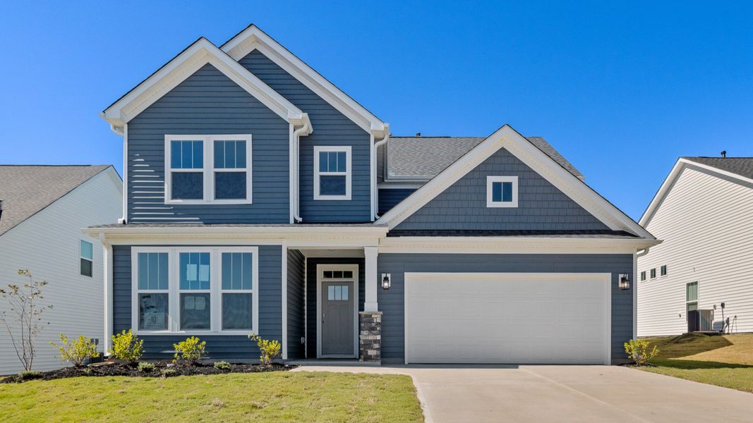 Representative exterior photo of a completed home built from the Drayton by DRB Homes in Walnut Ridge, Inman, SC (Image 21).