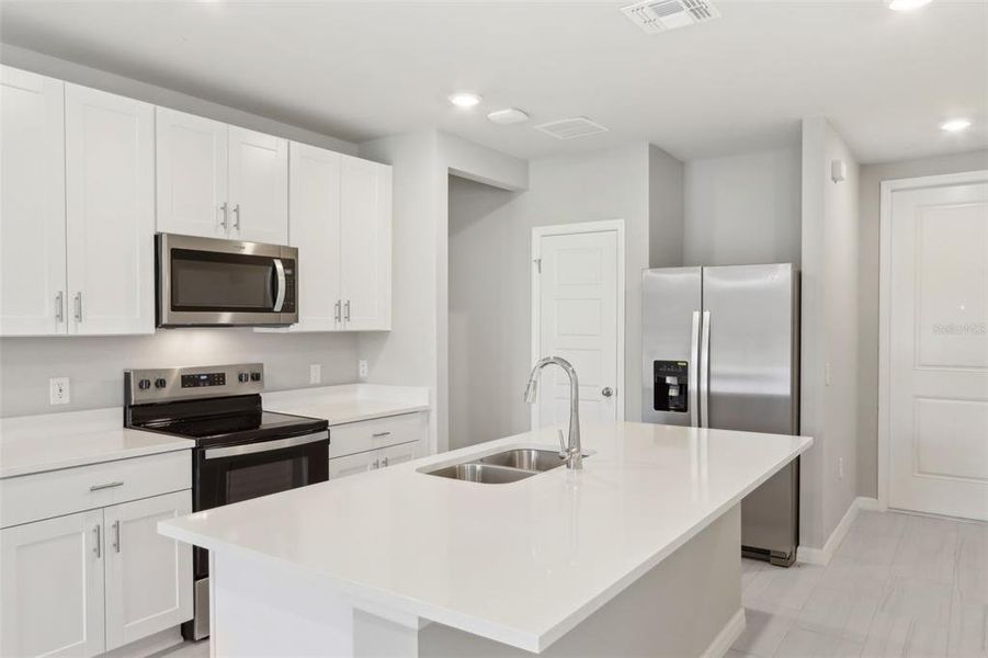 Furnished interior view inside a new home in Crescent Lakes - Premier Series, Punta Gorda (Image 7). Furnished interior view inside a new home in Crescent Lakes - Premier Series, Punta Gorda (Image 7).