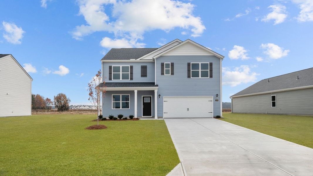 Front exterior of a new home in East Ridge, Ayden, NC, highlighting curb appeal (Image 2).