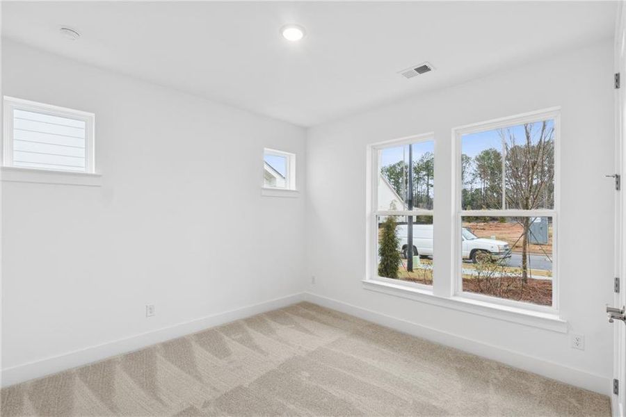 Spacious, unfurnished interior of a new home in Maple Grove at Towne Lake, Woodstock (Image 9).