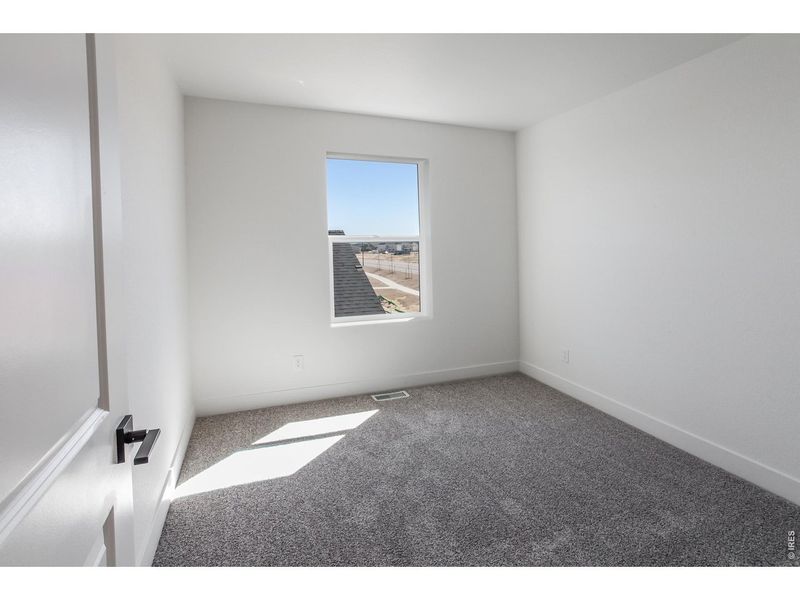 Spacious, unfurnished interior of a new home in Prairie Song Story Collection - Single Family Homes, Windsor (Image 22).