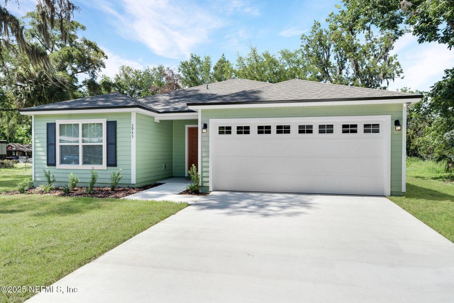 Front exterior of a new home in , Jacksonville, FL, highlighting curb appeal (Image 1). Front exterior of a new home in , Jacksonville, FL, highlighting curb appeal (Image 1).
