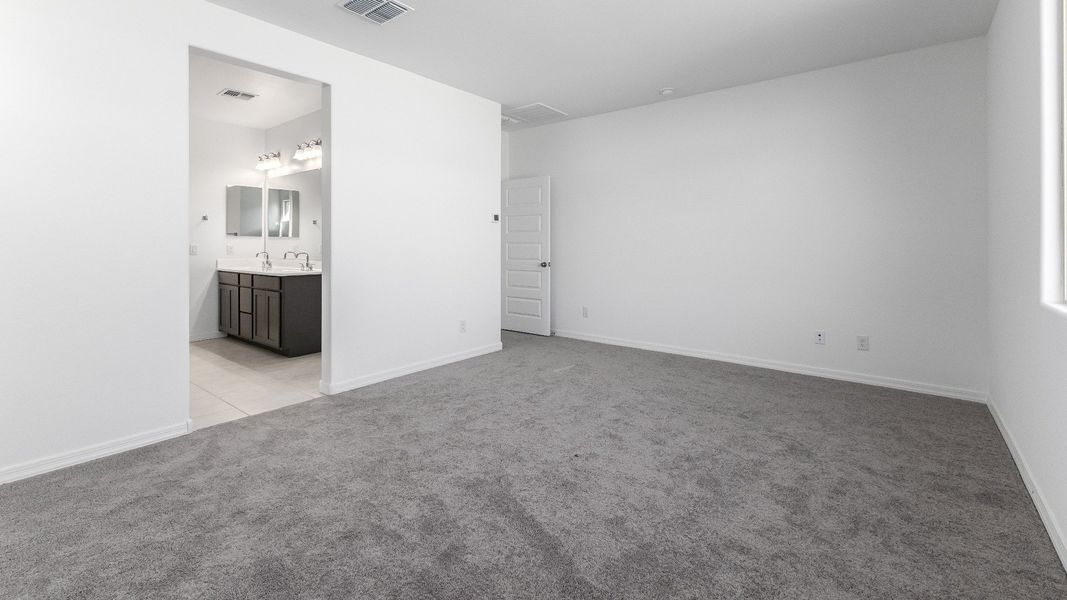 Furnished interior view inside a new home in Castillo at Anderson Parc, Buckeye (Image 14).