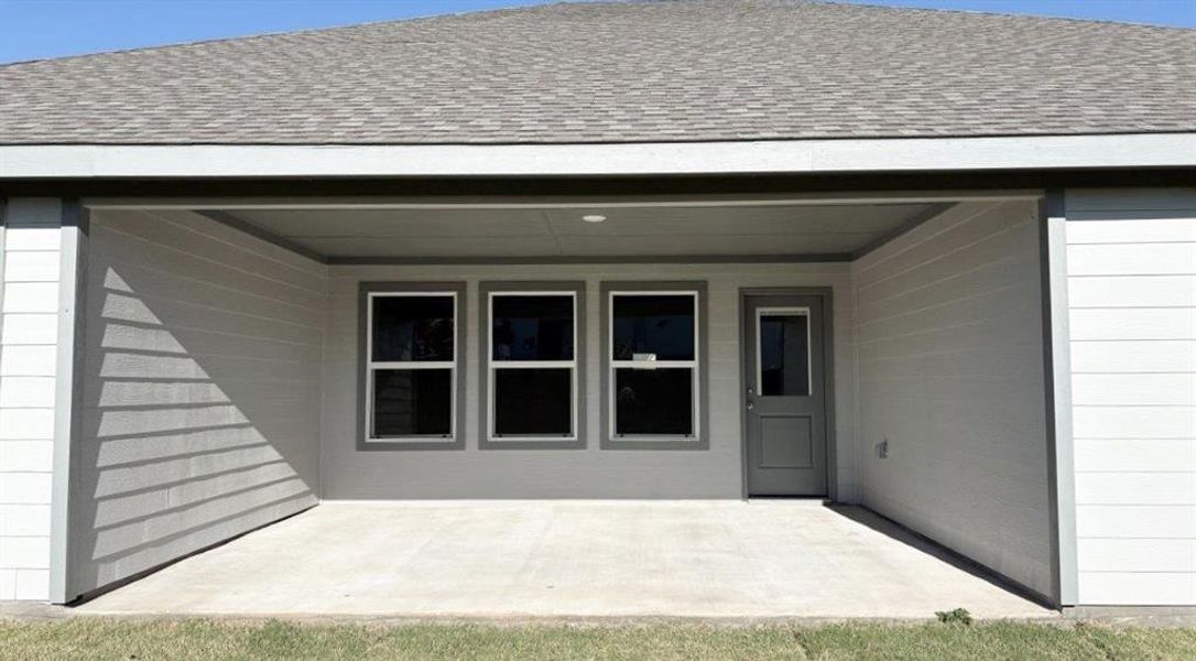 Exterior details and patio area of a home in Sandstone Estates, Granbury (Image 3). Exterior details and patio area of a home in Sandstone Estates, Granbury (Image 3).