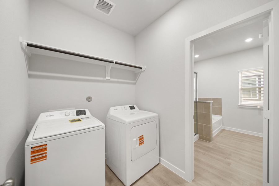 Furnished interior view inside a new home in Lexington Heights, Willis (Image 8). Furnished interior view inside a new home in Lexington Heights, Willis (Image 8).