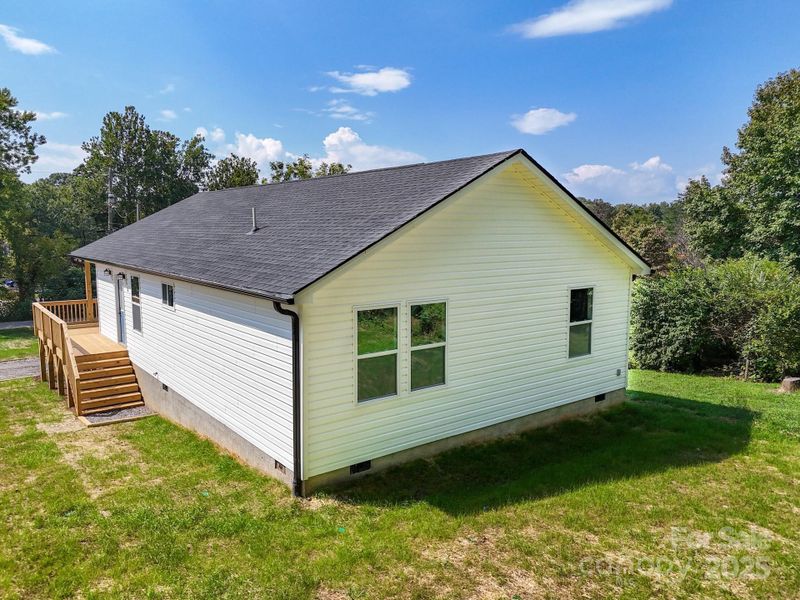 Front exterior of a new home in , Asheville, NC, highlighting curb appeal (Image 25).