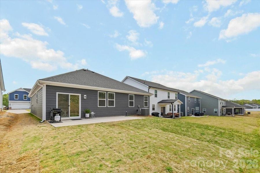 Exterior details and patio area of a home in Sheffield, Indian Trail (Image 24).