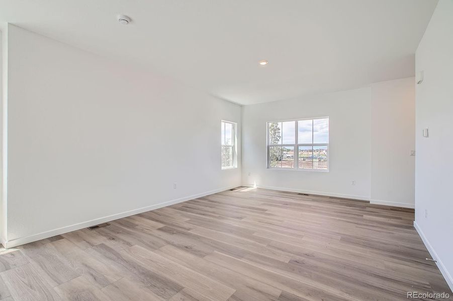 Spacious, unfurnished interior of a new home in Eastcreek Farm: Paired Homes, Thornton (Image 12).