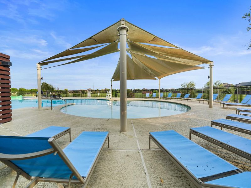 Relax in Cane Island’s resort-style pool, where shaded cabanas and lounge areas create the ultimate staycation vibe.