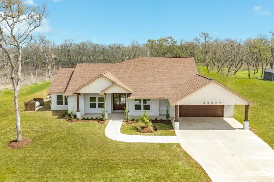 Front exterior of a new home in , Richwood, TX, highlighting curb appeal (Image 28).