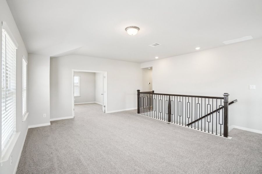 Second floor landing of the Reynolds floorplan at a Meritage Homes community.