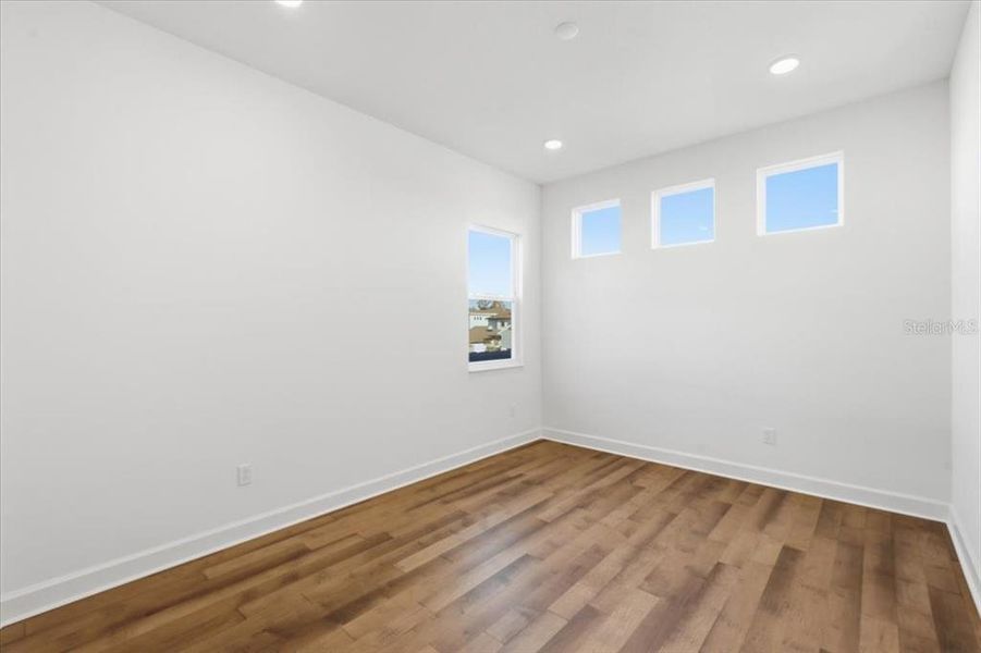 Spacious, unfurnished interior of a new home in Shorefront Cove, Winter Garden (Image 14).