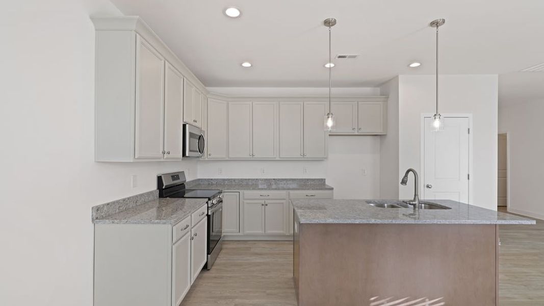 Furnished interior view inside a new home in Edgewood Estates, Greenville (Image 7).