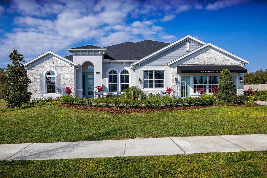 Front exterior of a new home in Wolf Lake Ranch, Apopka, FL, highlighting curb appeal (Image 21).