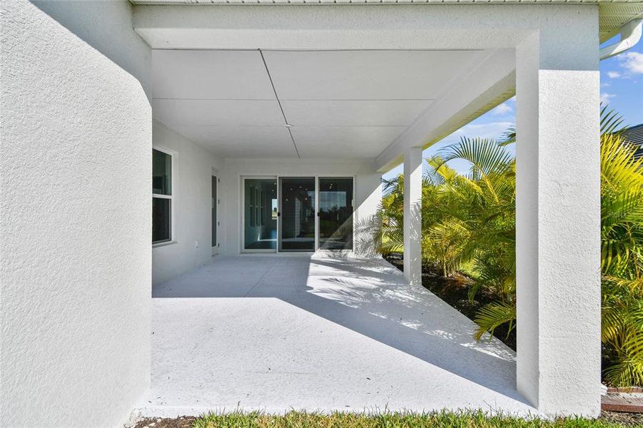 Exterior details and patio area of a home in Vistera of Venice – Cottage Series, Nokomis (Image 4).