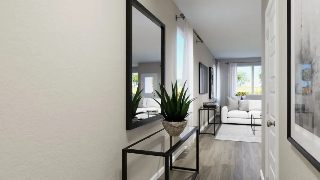 Representative furnished interior of a home built from the The Emerald by Legend Homes in River's Edge, Conroe (Image 5).