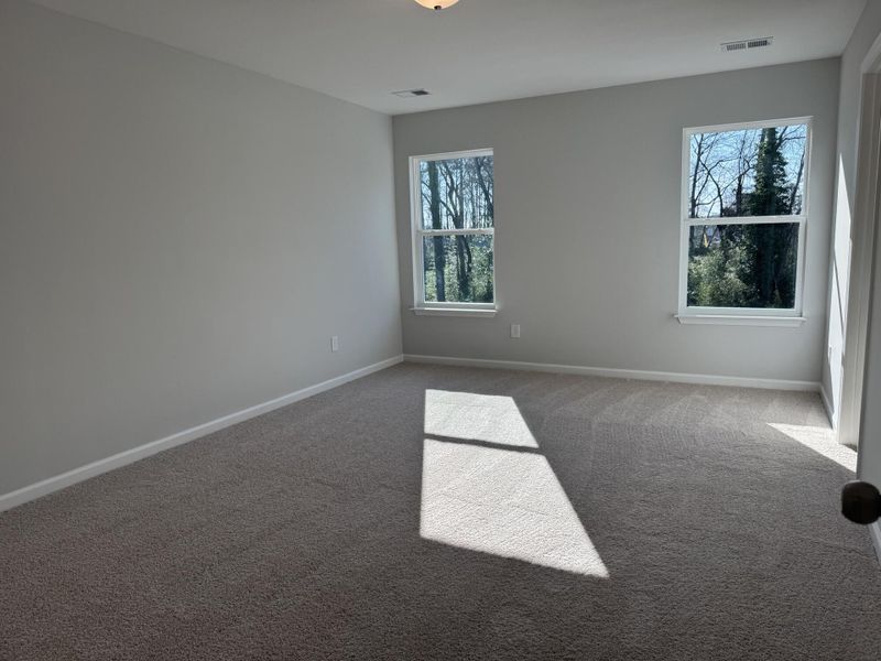 Spacious, unfurnished interior of a new home in East Main Townes, Spartanburg (Image 16).