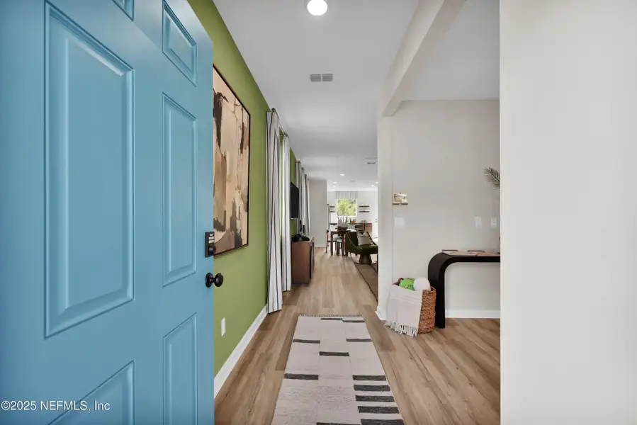 Furnished interior view inside a new home in Baxley Villas, Middleburg (Image 7).