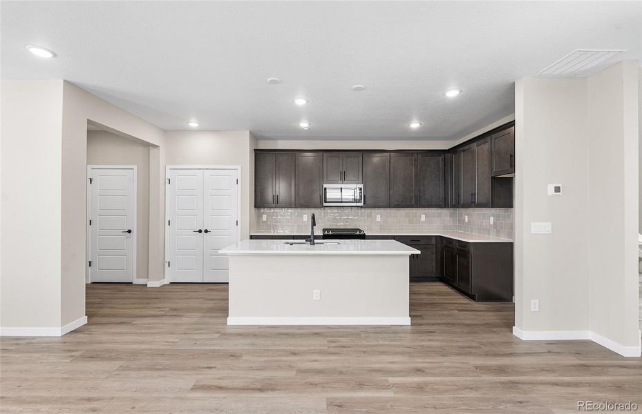 Furnished interior view inside a new home in Painted Prairie, Aurora (Image 10).