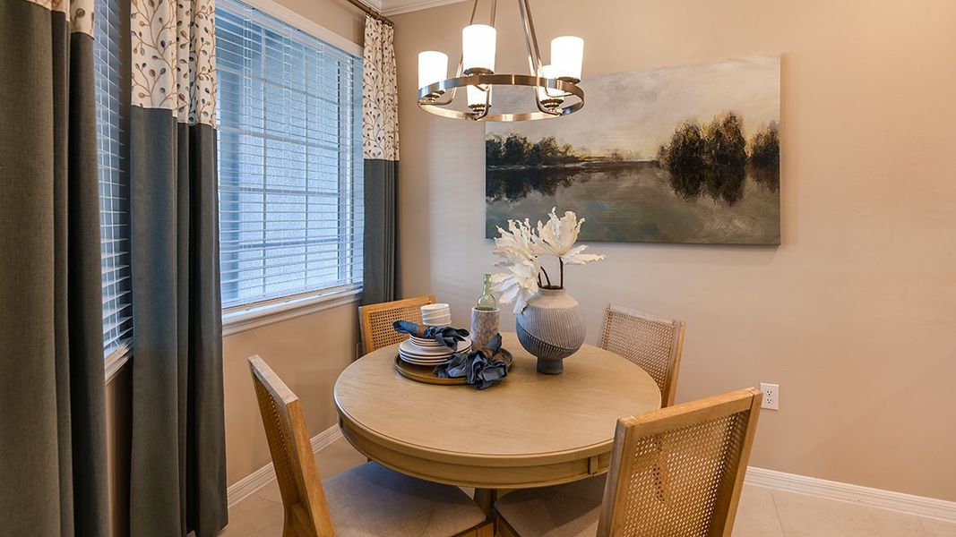 Representative furnished interior of a home built from the Avanti VII by Taylor Morrison in Esplanade at Rivergrass Condos, Naples (Image 12).
