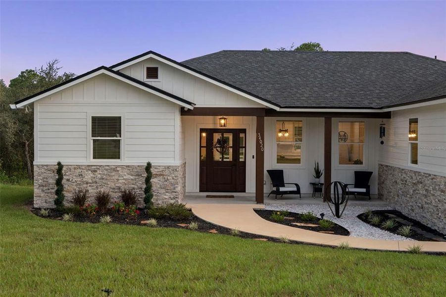 Front exterior of a new home in , Webster, FL, highlighting curb appeal (Image 23).