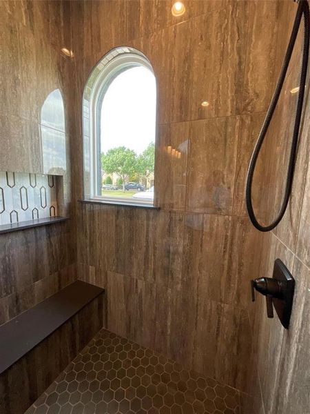 Bathroom with a tile shower