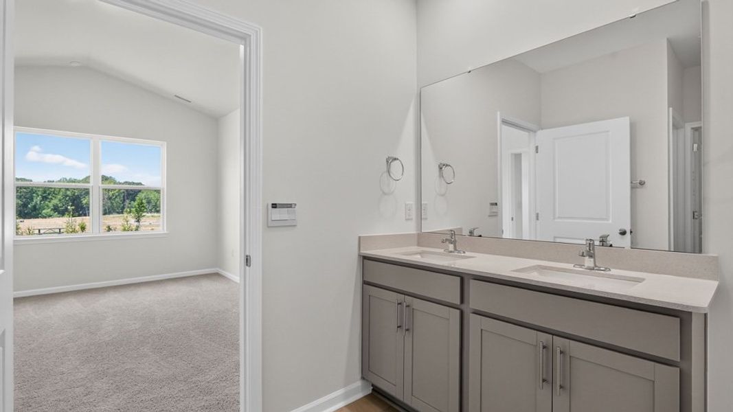 Furnished interior view inside a new home in The Grove at Matthews Landing, Fuquay Varina (Image 11).