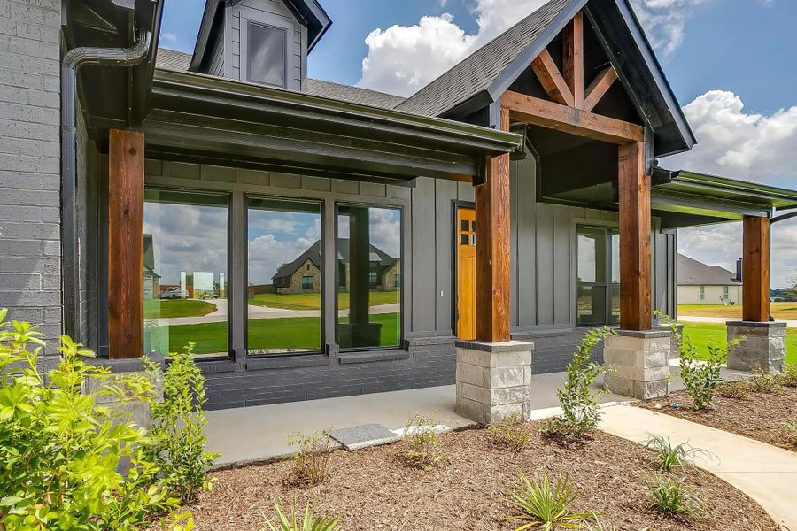 Representative exterior photo of a completed home built from the The Paxton by Elmwood Custom Homes in Matthews Farm, Venus, TX (Image 6). Representative exterior photo of a completed home built from the The Paxton by Elmwood Custom Homes in Matthews Farm, Venus, TX (Image 6).