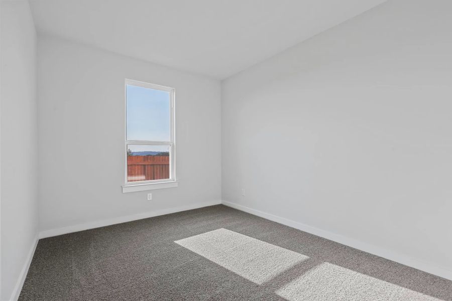 Representative unfurnished interior of a home built from the Garrison II by Cheldan Homes in Stoneview, Glen Rose (Image 79).