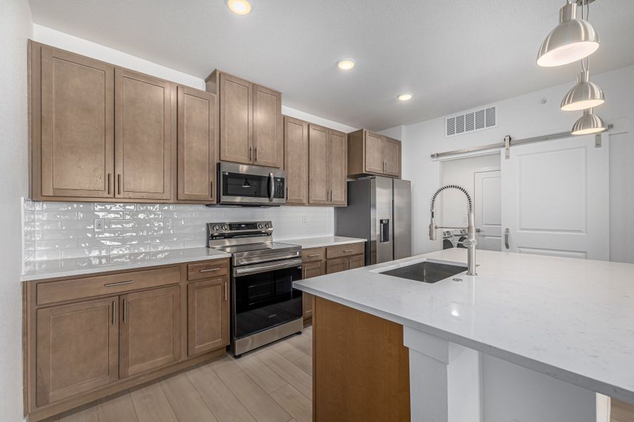 Furnished interior view inside a new home in The Residences at Victory Ridge, Colorado Springs (Image 3). Furnished interior view inside a new home in The Residences at Victory Ridge, Colorado Springs (Image 3).