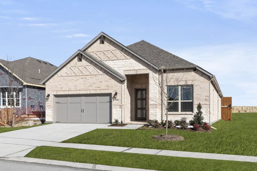 Front exterior of a new home in Brookshire at Legacy Hills, Celina, TX, highlighting curb appeal (Image 2). Front exterior of a new home in Brookshire at Legacy Hills, Celina, TX, highlighting curb appeal (Image 2).