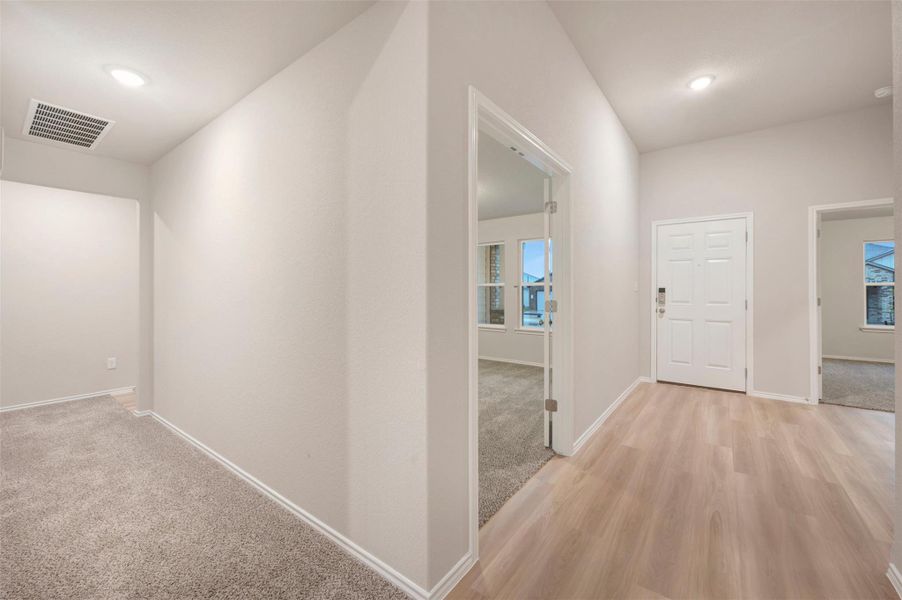 Spacious, unfurnished interior of a new home in Carillon, Manor (Image 9).