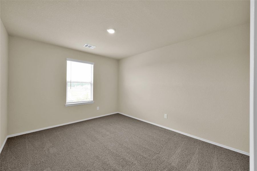 Spacious, unfurnished interior of a new home in Lakes at Black Oak, Magnolia (Image 20).
