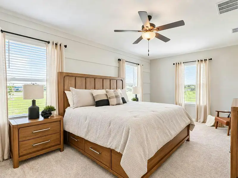 Your spacious owner`s suite is conveniently located downstairs - Wayfair III by Highland Homes