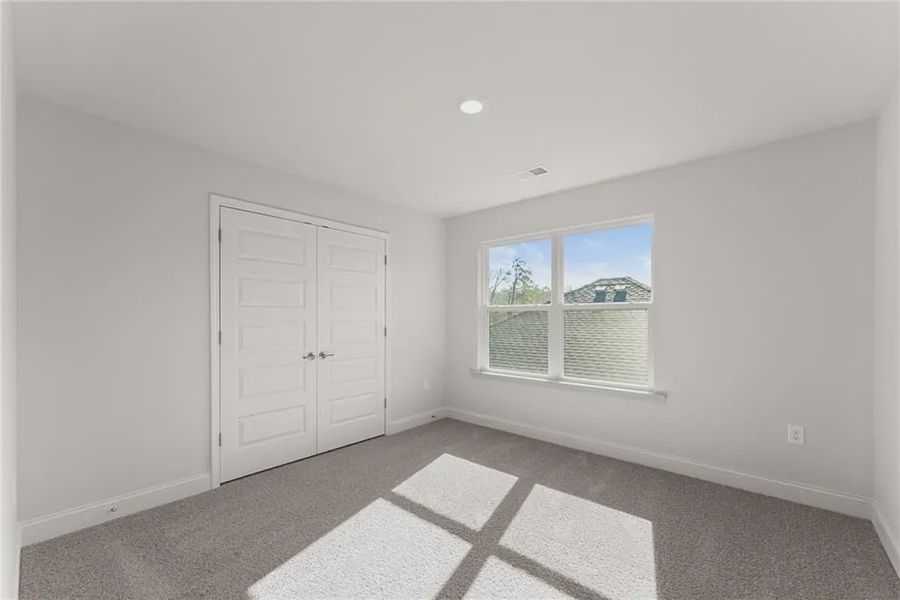 Representative unfurnished interior of a home built from the Plan 1709 by Adams Homes in Scarlett Place, Bowdon (Image 37).