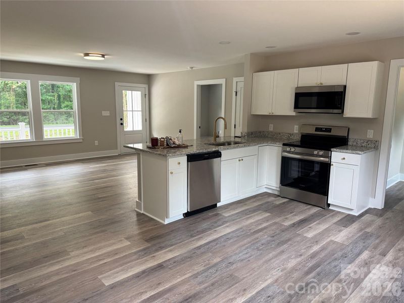 Representative photos shown. Images reflect a similar home with the same floor plan; interior finishes and colors may vary.