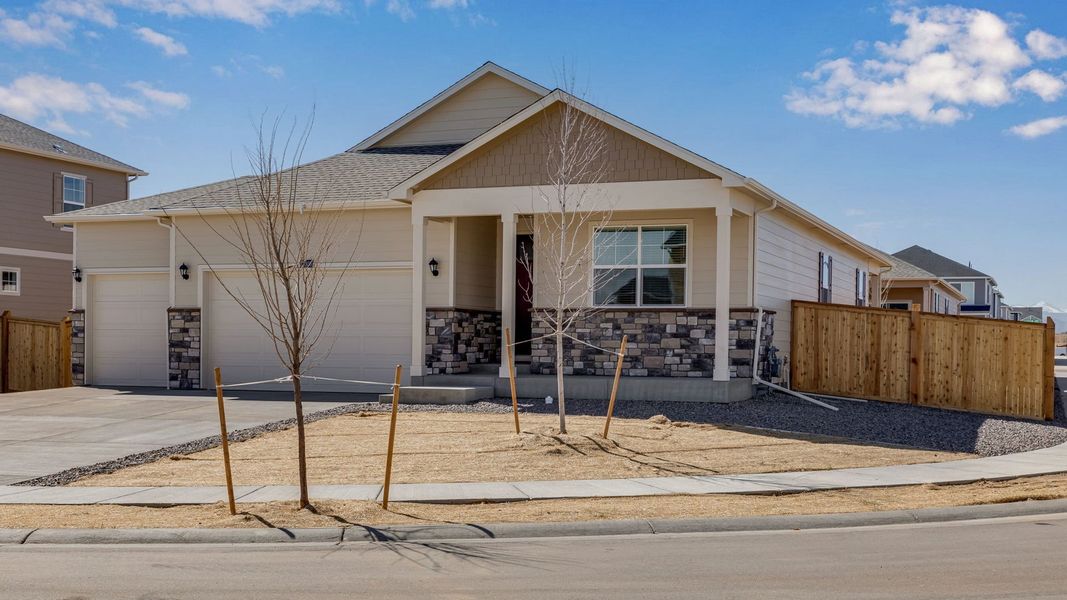 Front exterior of a new home in Lakeside Canyon, Mead, CO, highlighting curb appeal (Image 2). Front exterior of a new home in Lakeside Canyon, Mead, CO, highlighting curb appeal (Image 2).