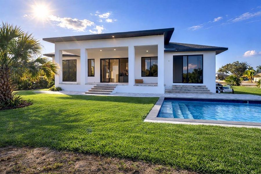 Exterior details and patio area of a home in , Port Charlotte (Image 21).
