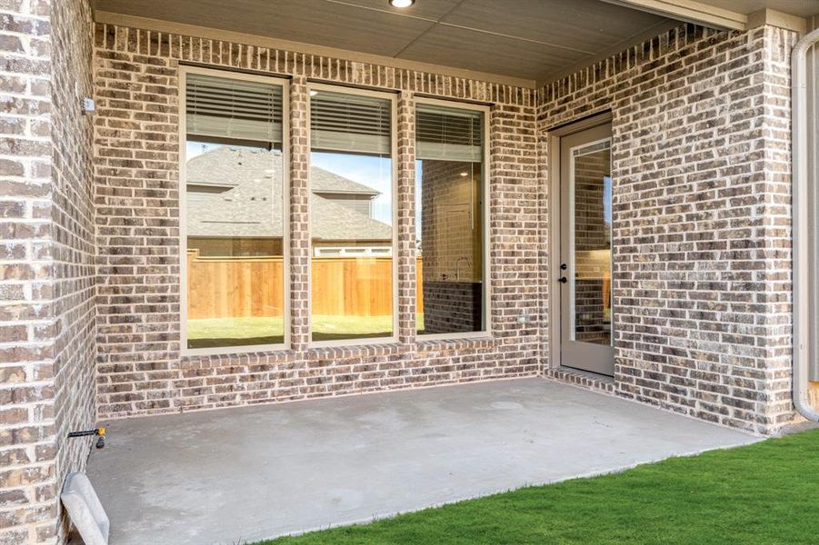 Exterior details and patio area of a home in Creekview Meadows, Pilot Point (Image 27). Exterior details and patio area of a home in Creekview Meadows, Pilot Point (Image 27).