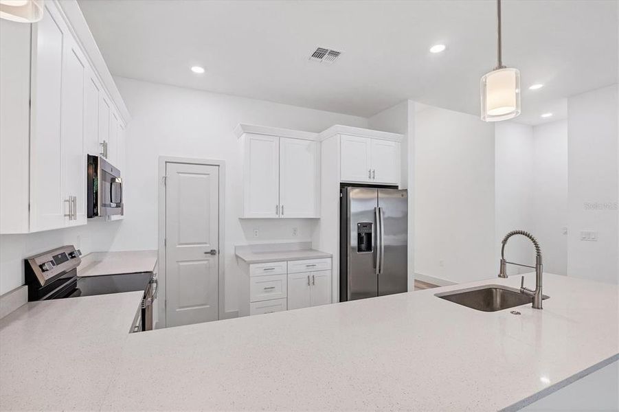 Furnished interior view inside a new home in , Port Charlotte (Image 9).