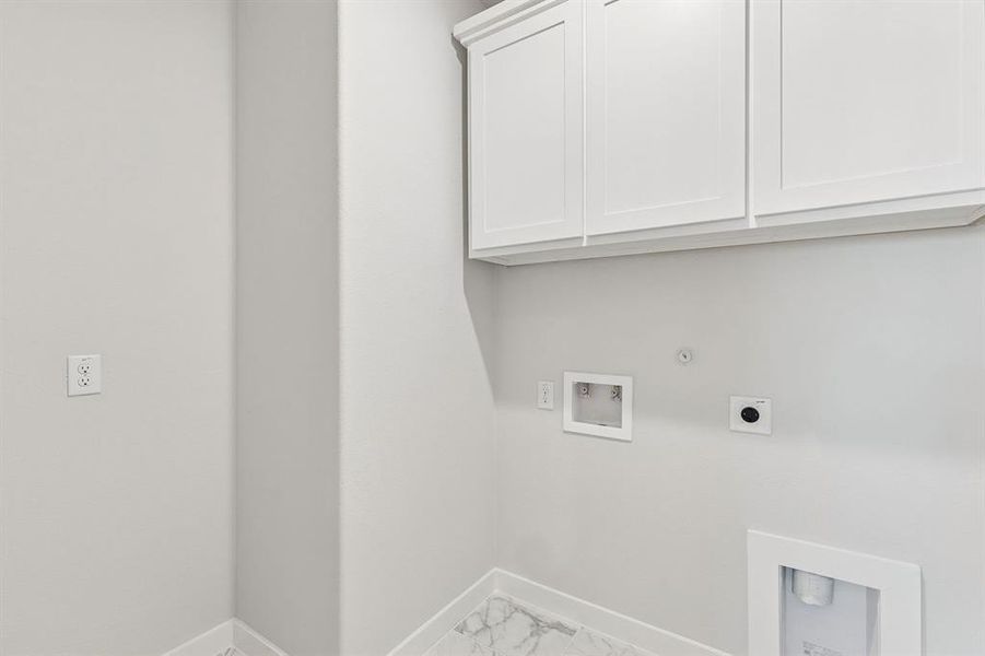 Utility Room in the Masters home plan by Trophy Signature Homes – REPRESENTATIVE PHOTO Utility Room in the Masters home plan by Trophy Signature Homes – REPRESENTATIVE PHOTO