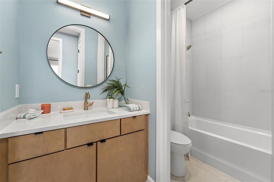 Furnished interior view inside a new home in EvenTide, New Smyrna Beach (Image 30).