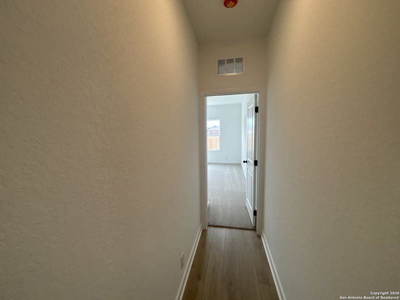 Spacious, unfurnished interior of a new home in The Heights at Saddlebrook Ranch 60's, Schertz (Image 20).