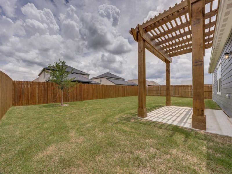 Exterior details and patio area of a home in Pebblebrook, Sherman (Image 3).