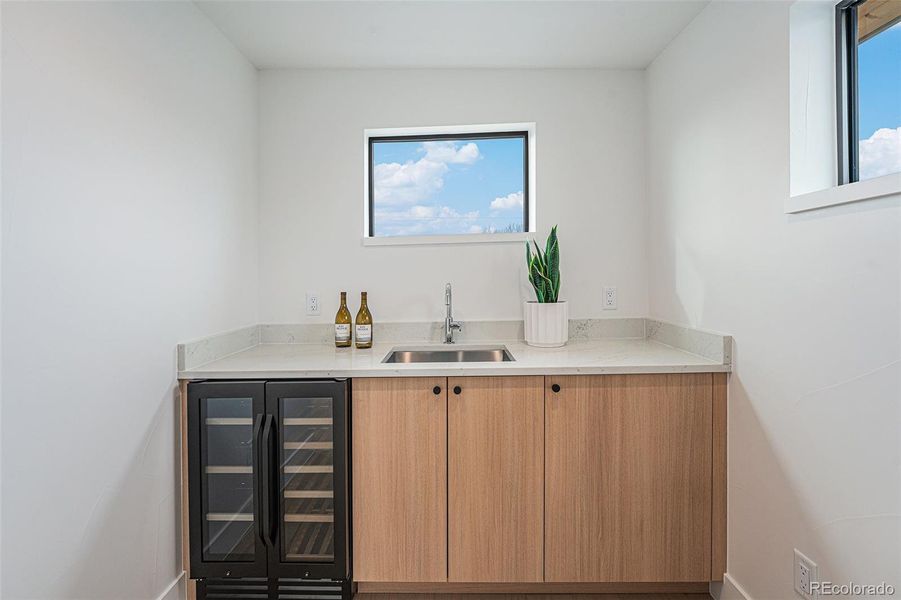 3rd floor wet bar with drink cooler