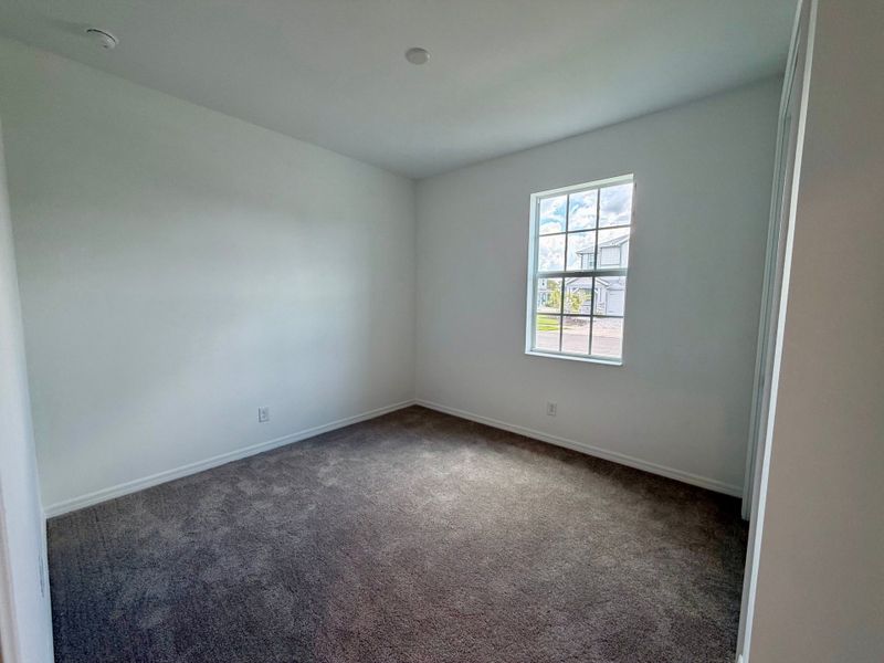 Representative unfurnished interior of a home built from the Juno by William Ryan Homes in The Sanctuary – Resort Collection, Punta Gorda (Image 29).