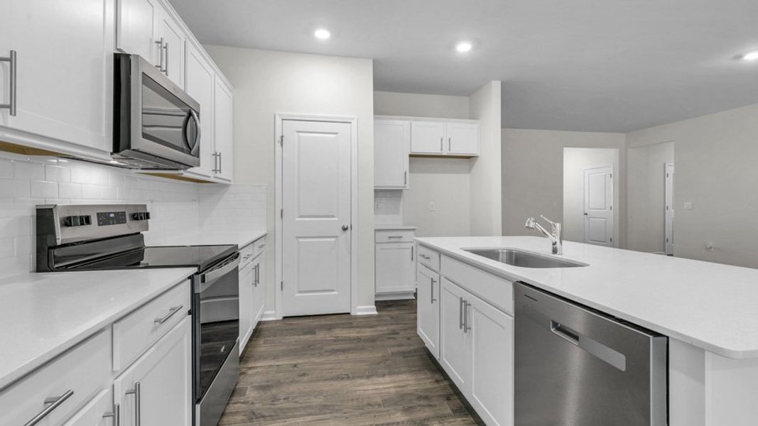Furnished interior view inside a new home in Cross Creek, Spring Lake (Image 7).
