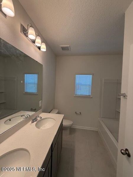 Furnished interior view inside a new home in Brook Forest - Villas, St. Augustine (Image 5).