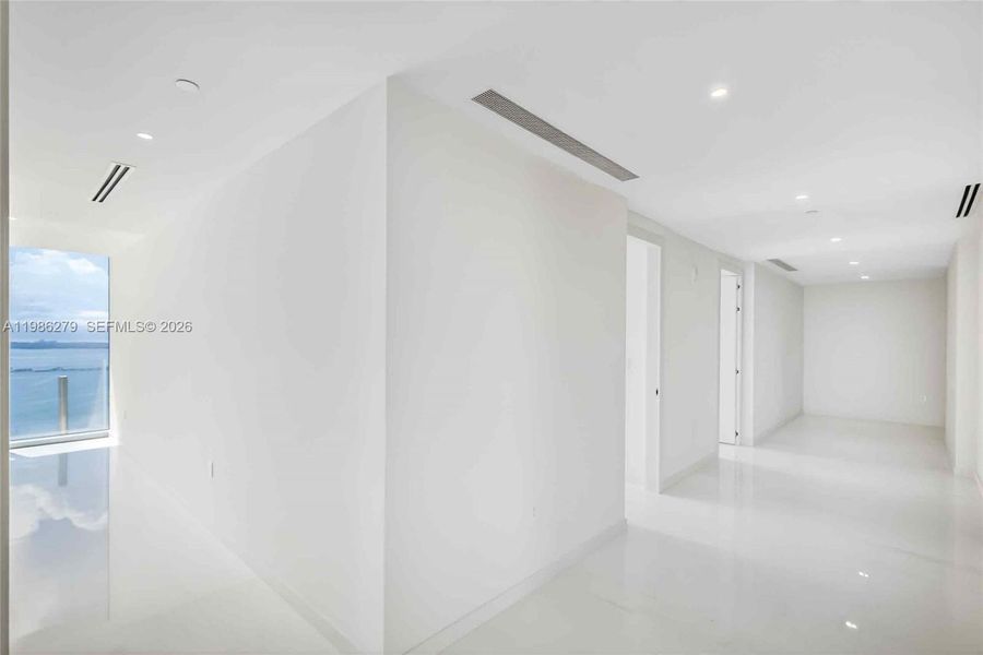 Spacious, unfurnished interior of a new home in Aston Martin Residences, Miami (Image 30). Spacious, unfurnished interior of a new home in Aston Martin Residences, Miami (Image 30).