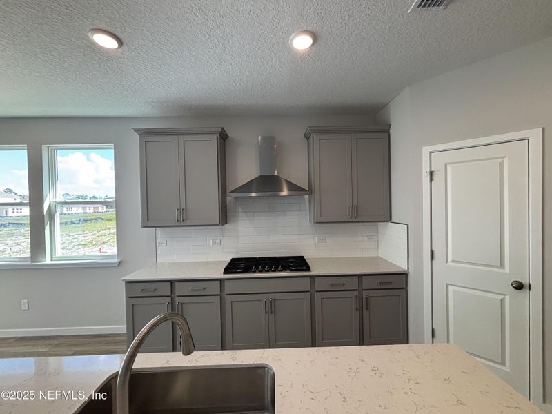 Furnished interior view inside a new home in The Magnolia Series at Reserve East, Flagler Beach (Image 9).
